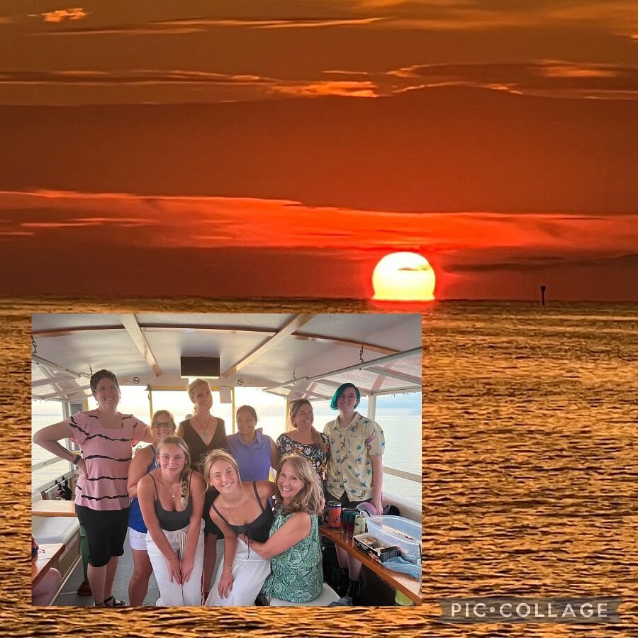 Sunset party cruise guests dancing on River Skipper II