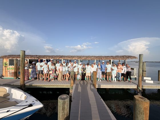 A large group on the dock after a pub crawl cruise