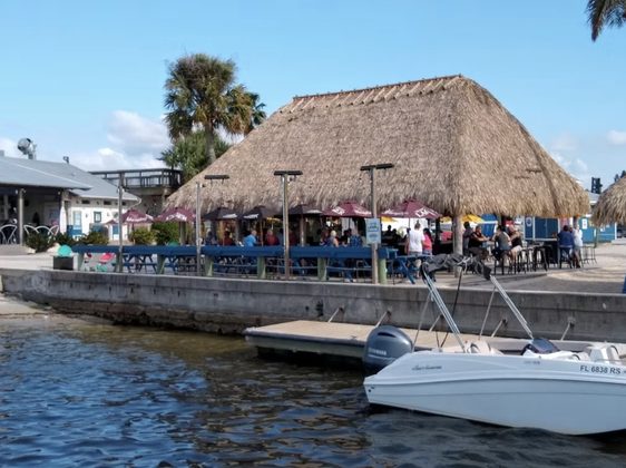 A waterfront tiki bar stop on the river pub crawl